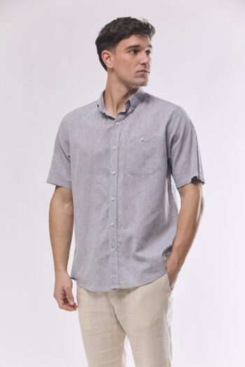 Camisa lisa relaxed fit de lino